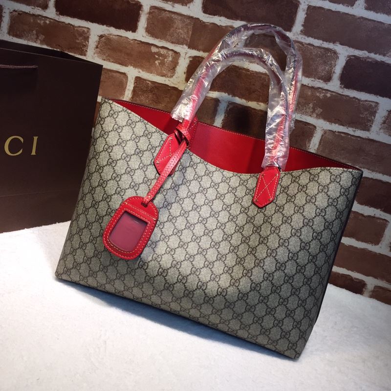 G*u*i shopping bags